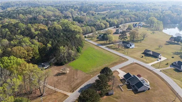 an aerial view of a house with a ocean view