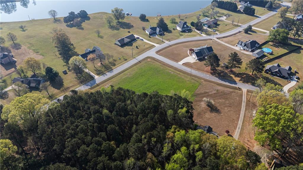 0 Bear Creek Trail Hampton, GA 30228 - Photo 5 of 6 an aerial view of a house with a yard
