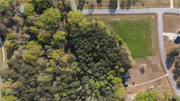 a view of a balcony with floor to ceiling windows and outdoor view