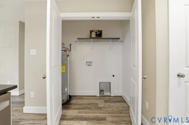 a view of a livingroom from the hallway