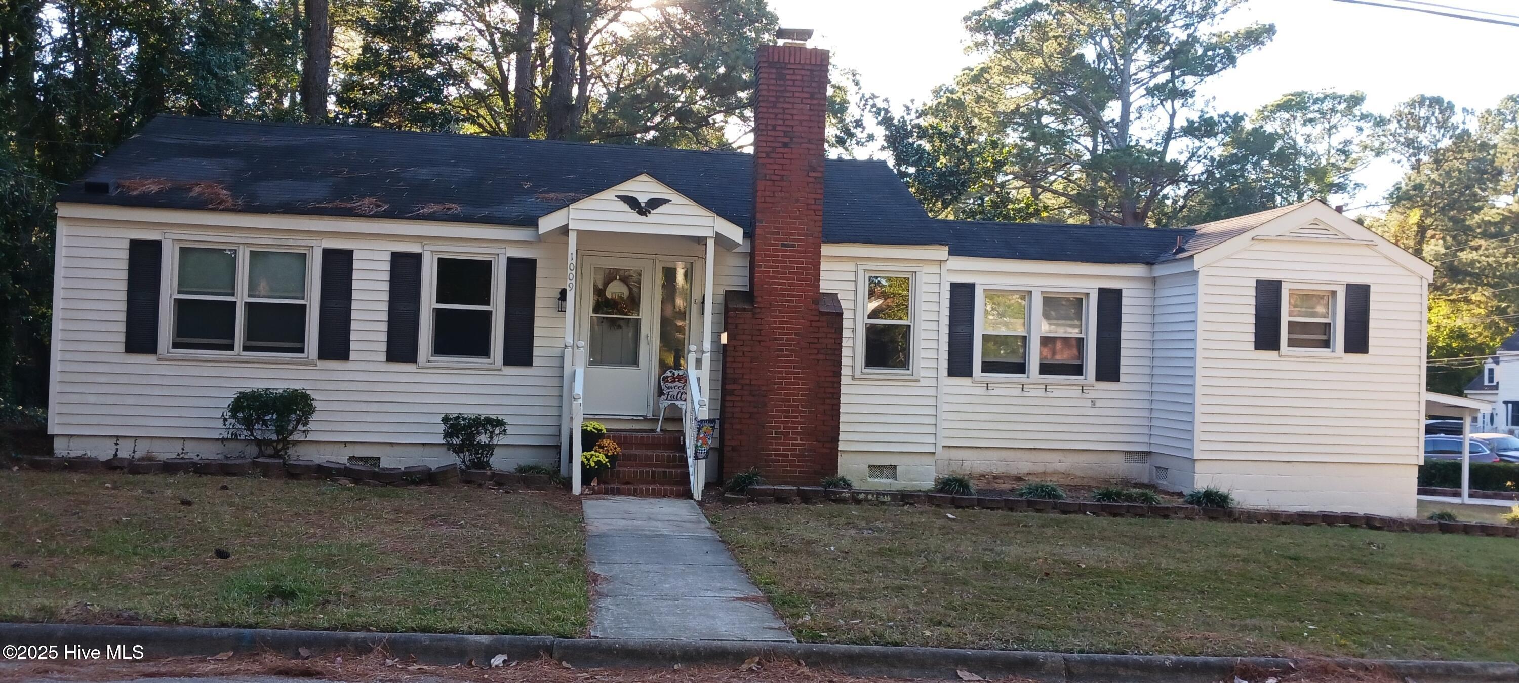 1009 Walnut Street West Wilson, NC 27893 - Photo 1 of 9 Walnut Front