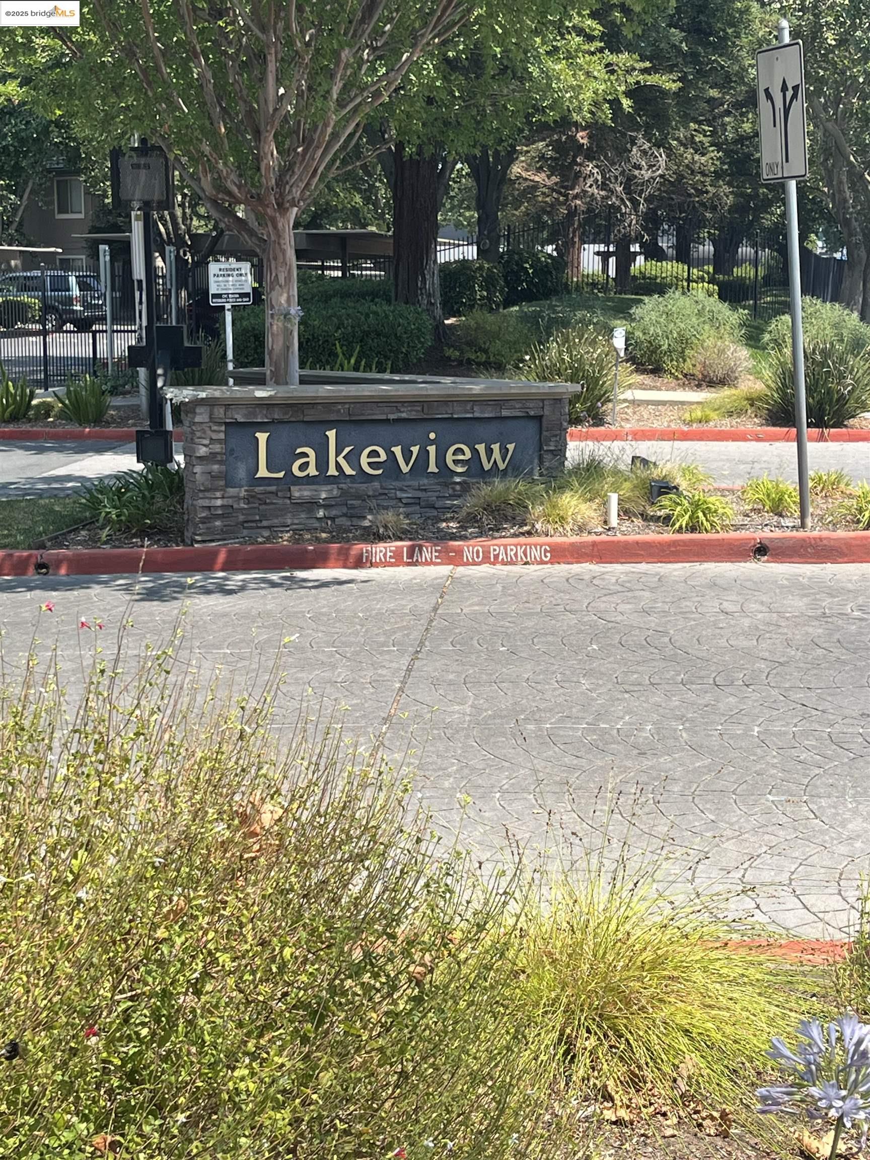 a view of a street with a building in the background