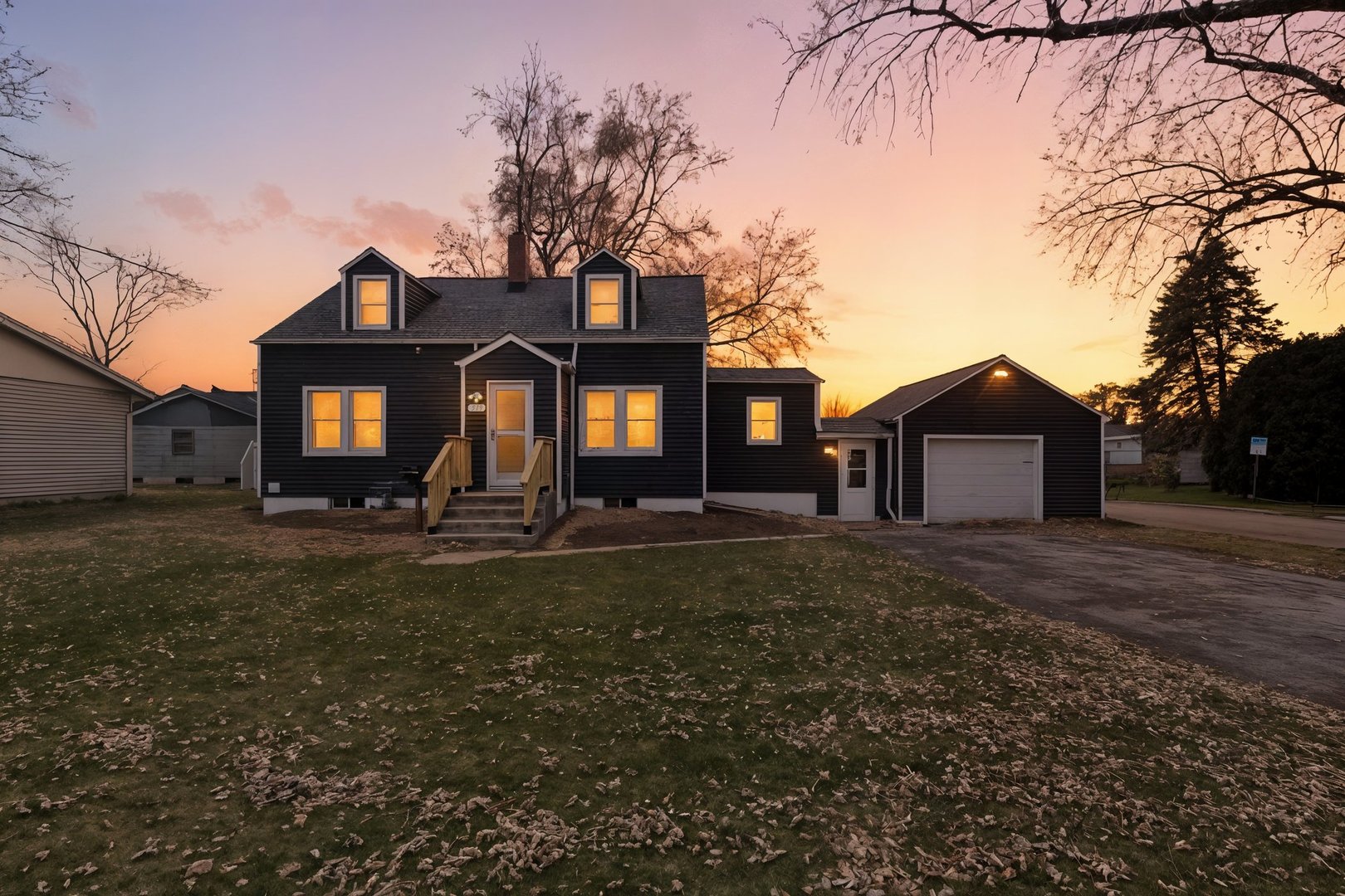 519 South Sycamore Street Genoa, IL 60135 - Photo 1 of 36 a front view of house with small garden