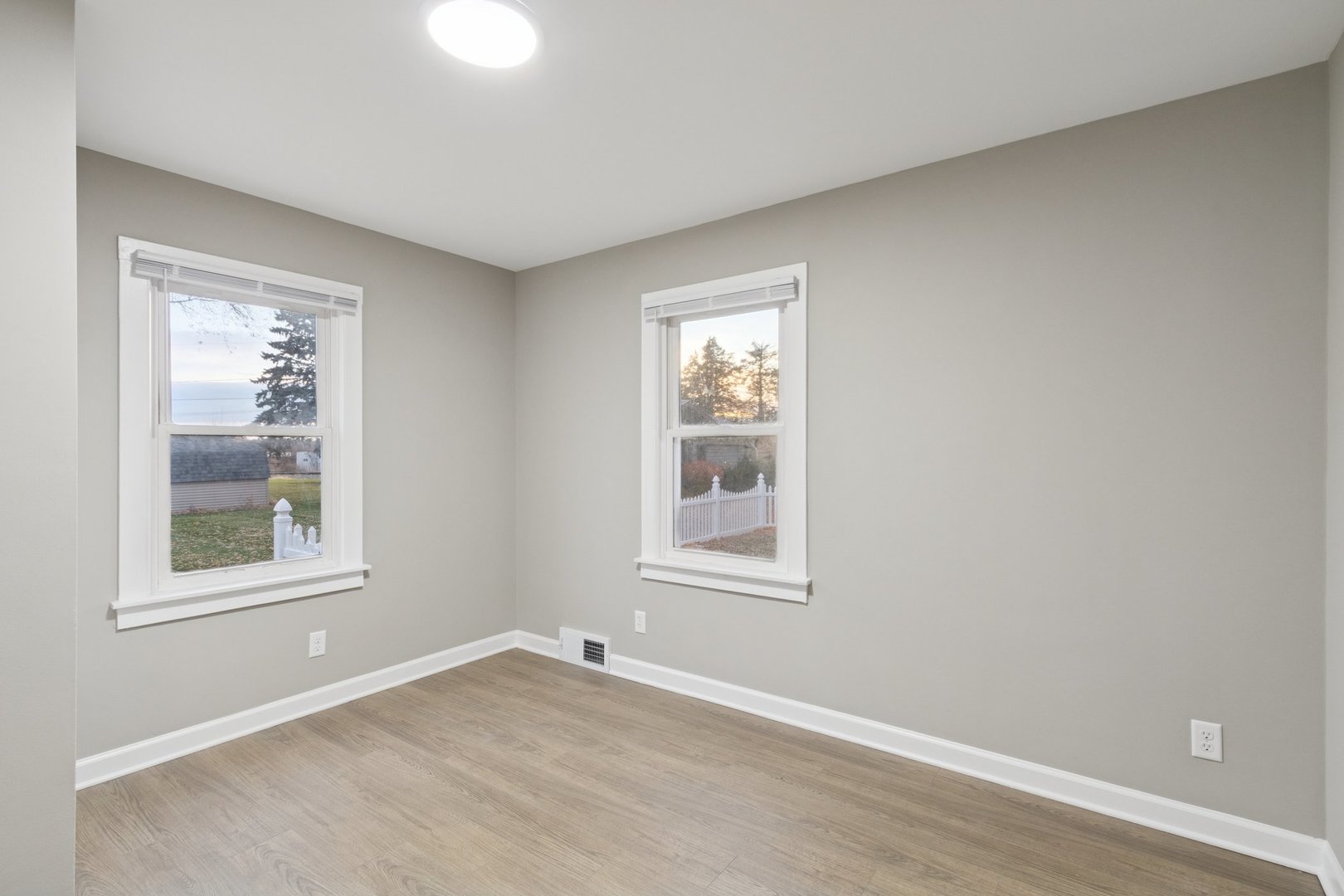 519 South Sycamore Street Genoa, IL 60135 - Photo 16 of 36 an empty room with windows and closet