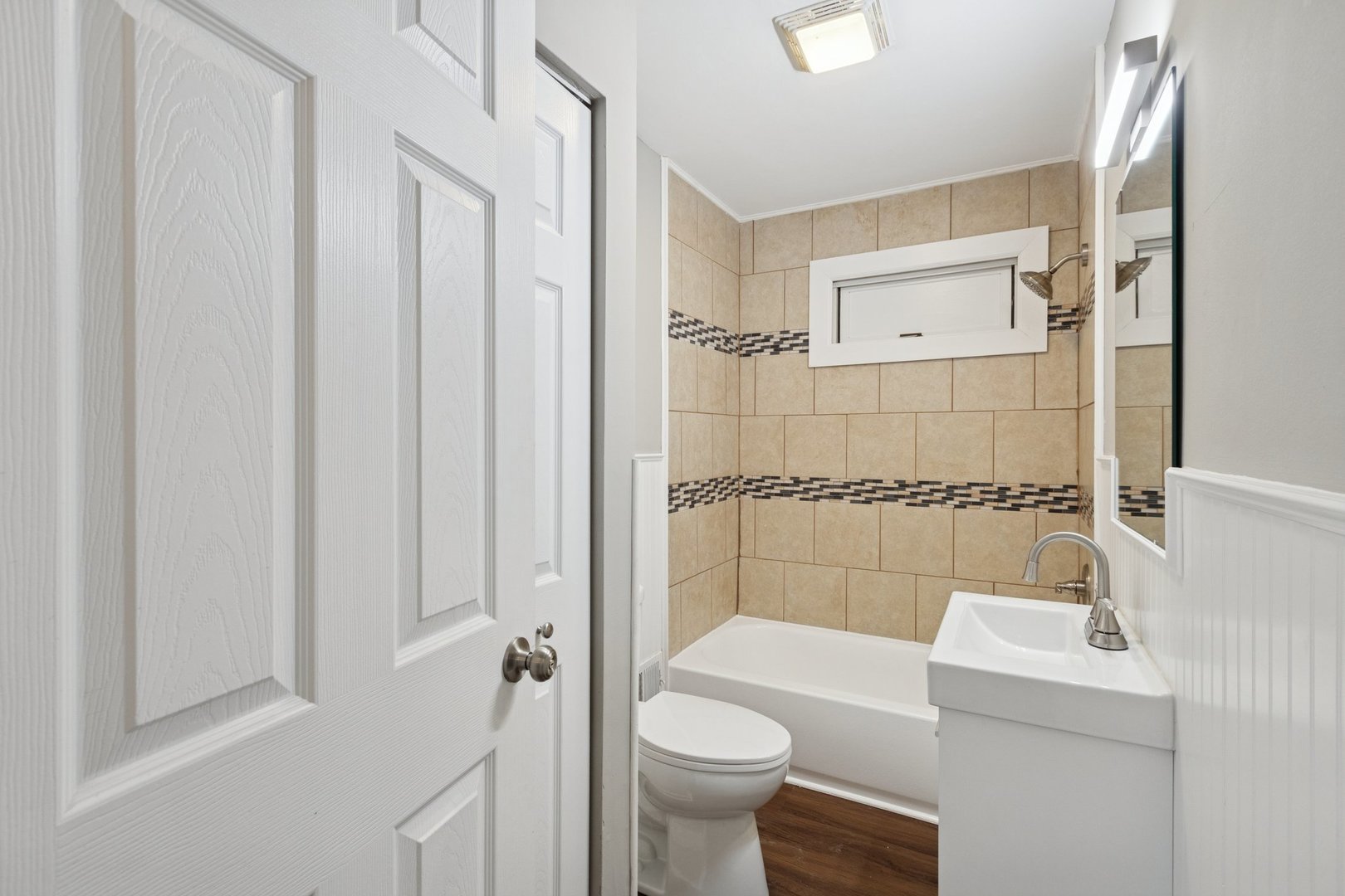 519 South Sycamore Street Genoa, IL 60135 - Photo 20 of 36 a bathroom with a sink a toilet and shower