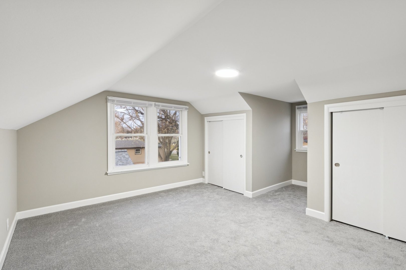 519 South Sycamore Street Genoa, IL 60135 - Photo 24 of 36 an empty room with a empty space and windows