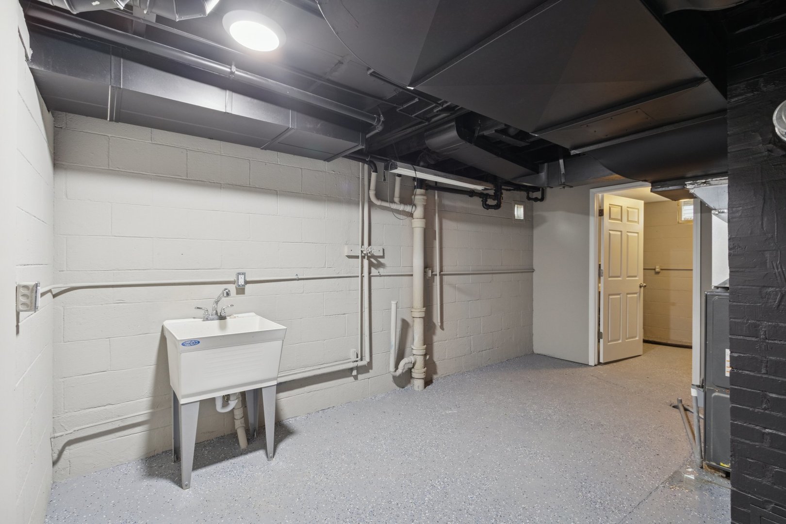 519 South Sycamore Street Genoa, IL 60135 - Photo 30 of 36 a view of a storage & utility room