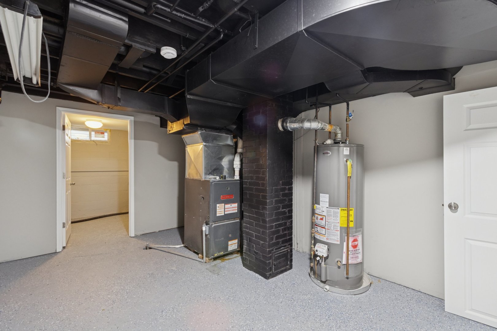 519 South Sycamore Street Genoa, IL 60135 - Photo 31 of 36 a view of water heater room