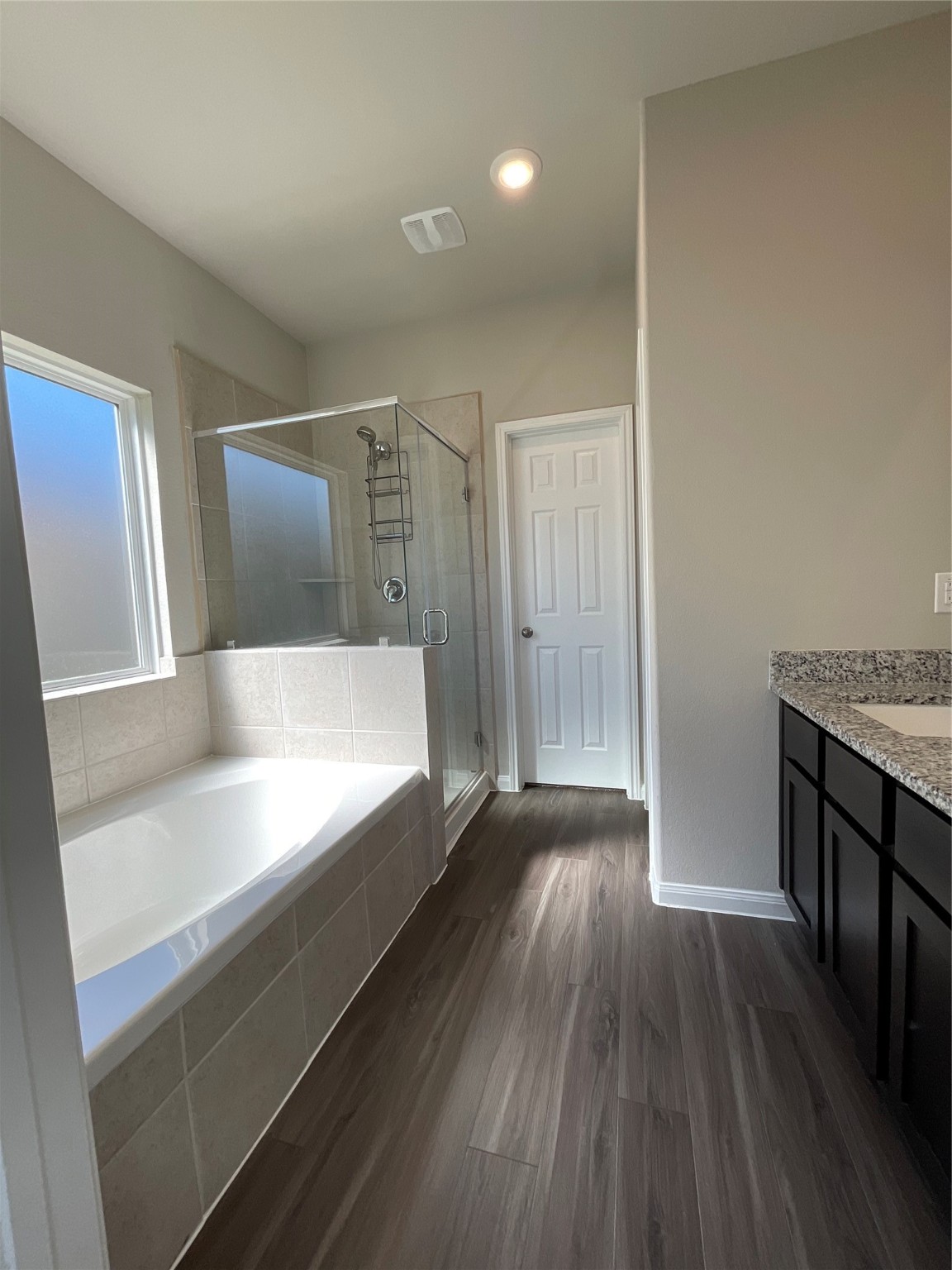 5311 Briana Dee Drive Rosharon, TX 77583 - Photo 11 of 21 a bathroom with a sink a large mirror and vanity