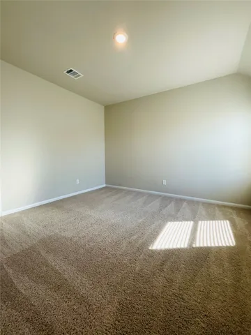 an empty room with a natural light