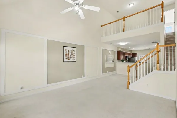 a view of a hallway with staircase