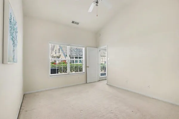 an empty room with windows