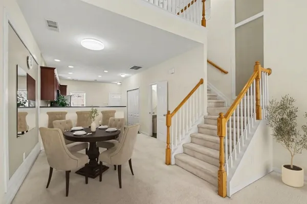 a view of a dining room with furniture