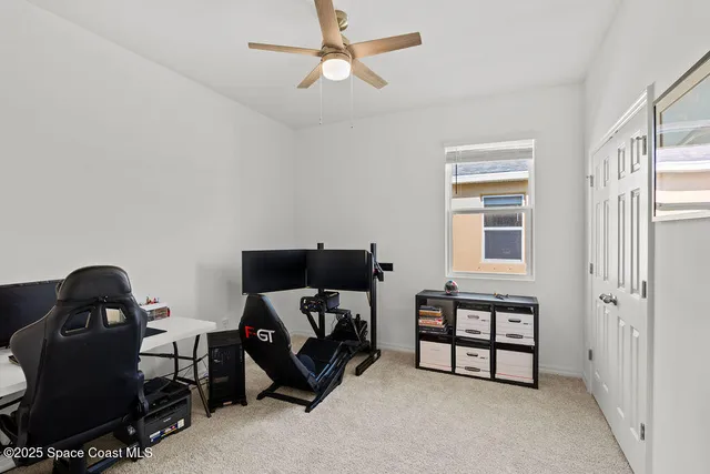 a bedroom with furniture and a window