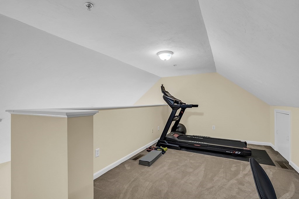 417 Hildreth Street, Unit 3 Lowell, MA 01850 - Photo 25 of 37 a view of a room with gym equipment