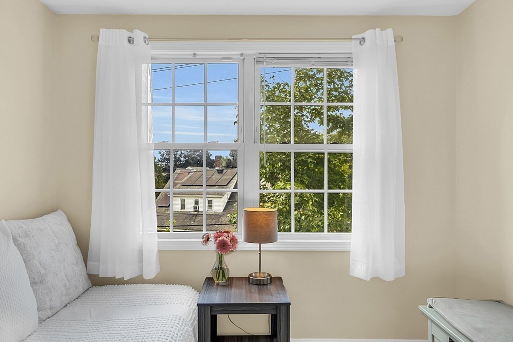 417 Hildreth Street, Unit 3 Lowell, MA 01850 - Photo 28 of 37 a room with a window and pool table