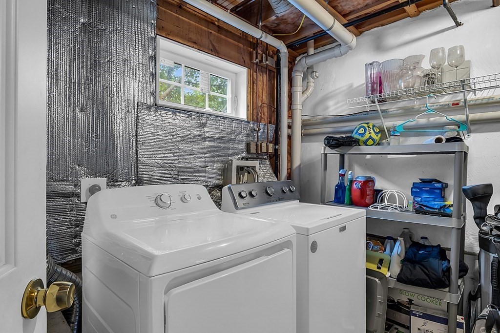 417 Hildreth Street, Unit 3 Lowell, MA 01850 - Photo 31 of 37 a utility room with dryer and washer