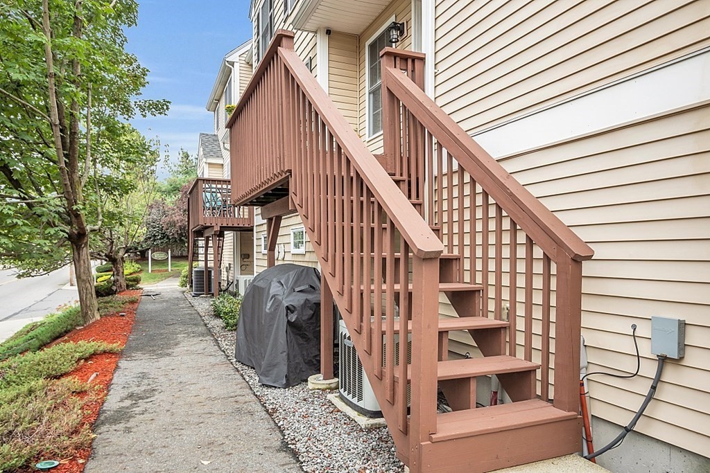 417 Hildreth Street, Unit 3 Lowell, MA 01850 - Photo 35 of 37 a view of a house with backyard and deck