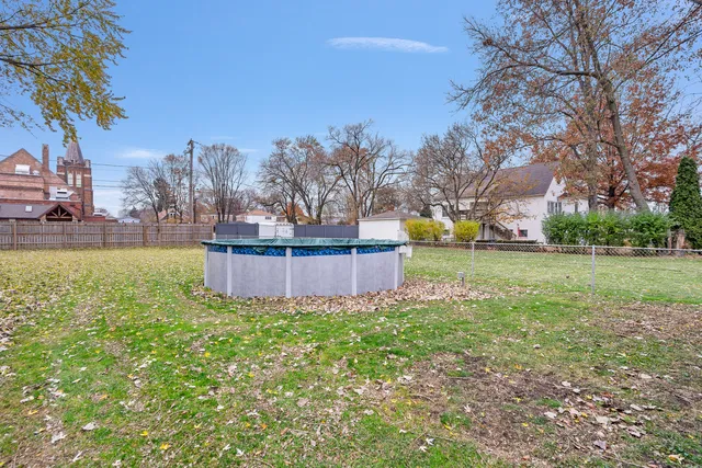 a view of a street that has couple of cars parked on the road