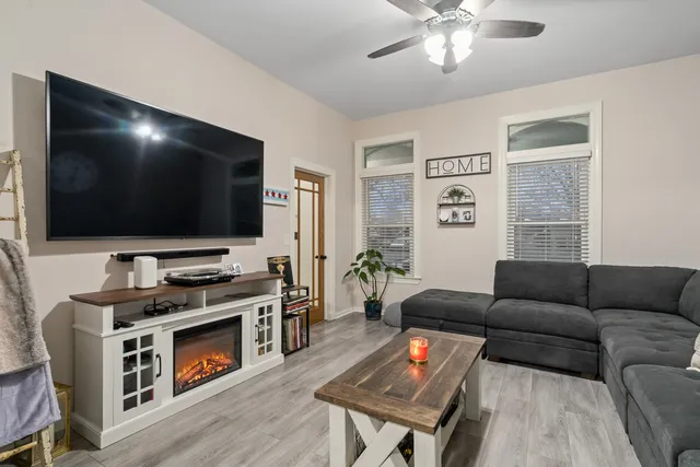 a living room with furniture and a window