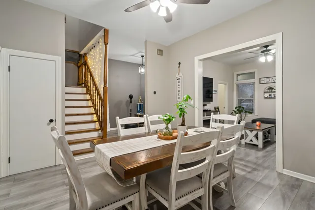 a kitchen with stainless steel appliances granite countertop a stove top oven a sink and dishwasher
