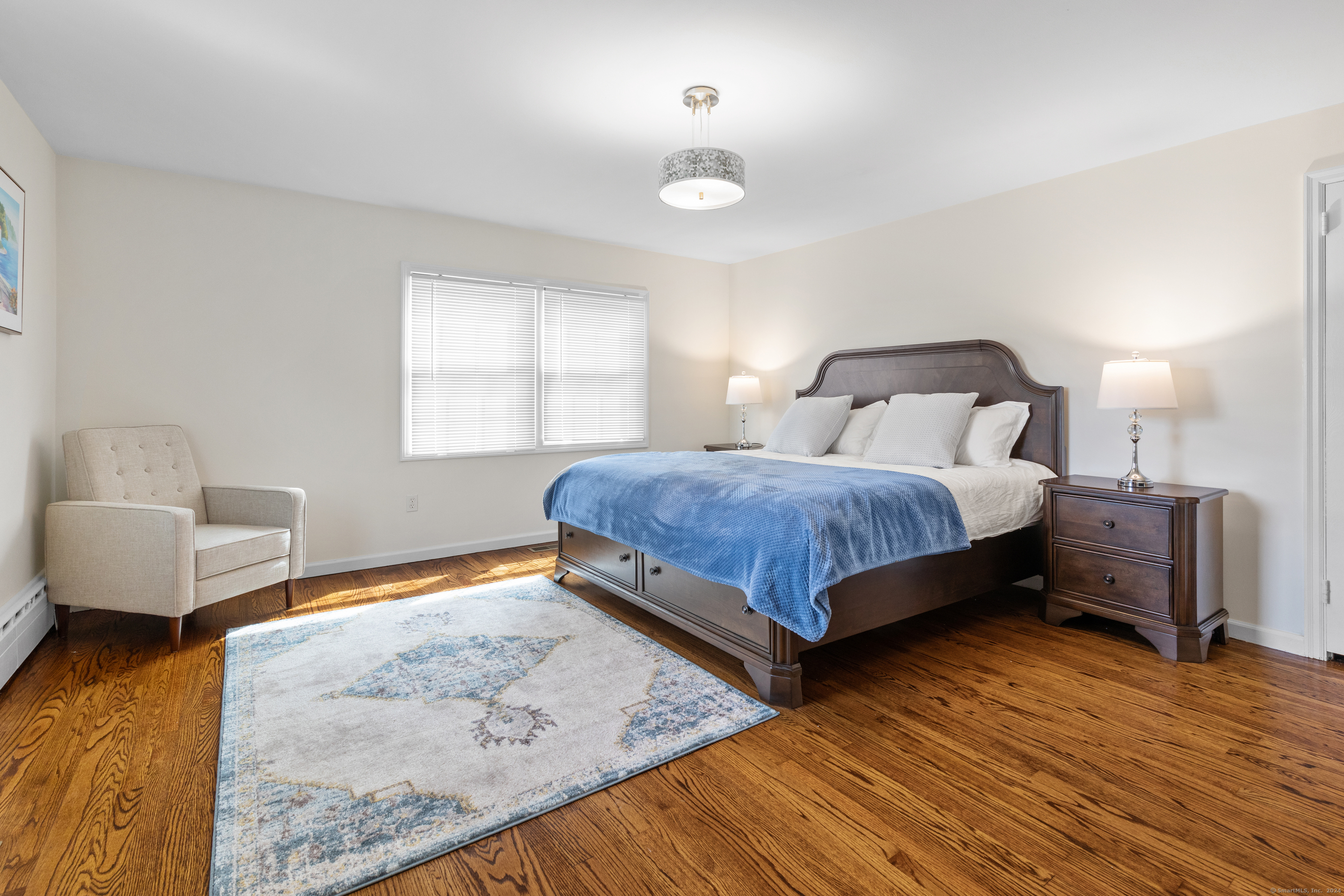 72 Cherry Lane Madison, CT 06443 - Photo 19 of 40 a bedroom with bed and window