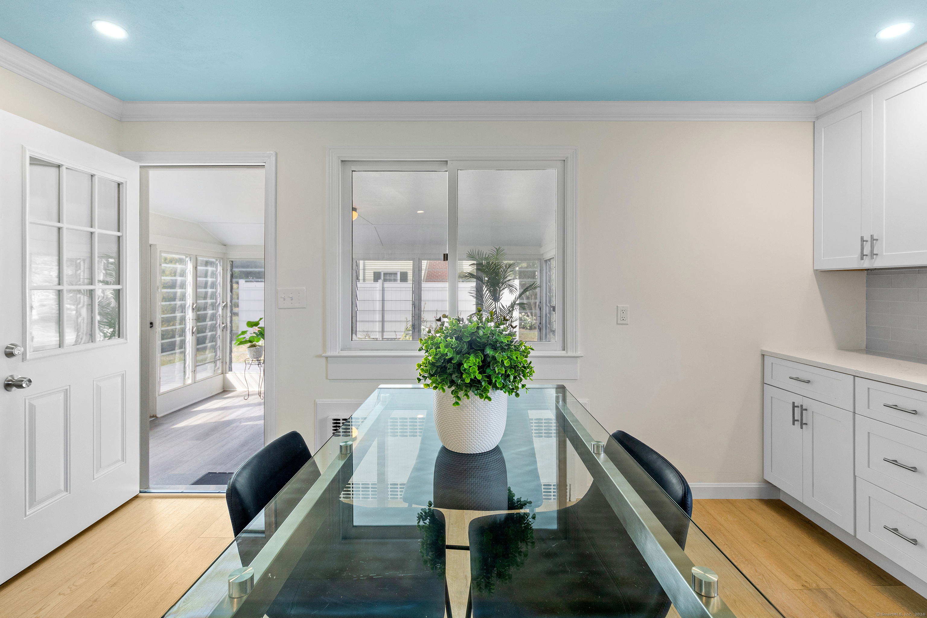 72 Cherry Lane Madison, CT 06443 - Photo 25 of 40 a view of a living room and a potted plant