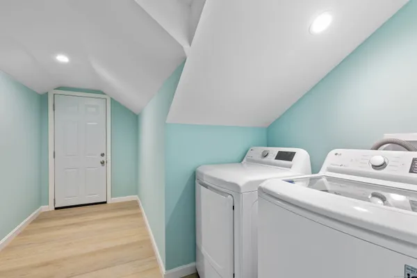 a utility room with dryer and washer