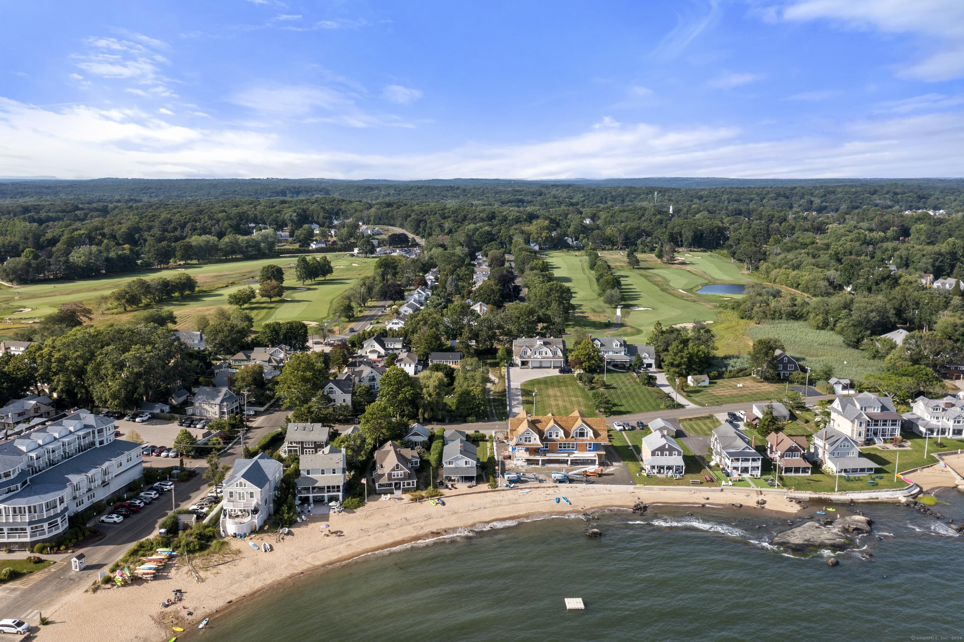 72 Cherry Lane Madison, CT 06443 - Photo 37 of 40 an aerial view of a city with lots of residential buildings