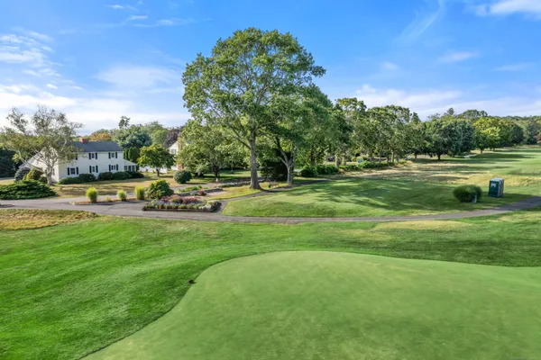 a childrens park with lots of swings and slides