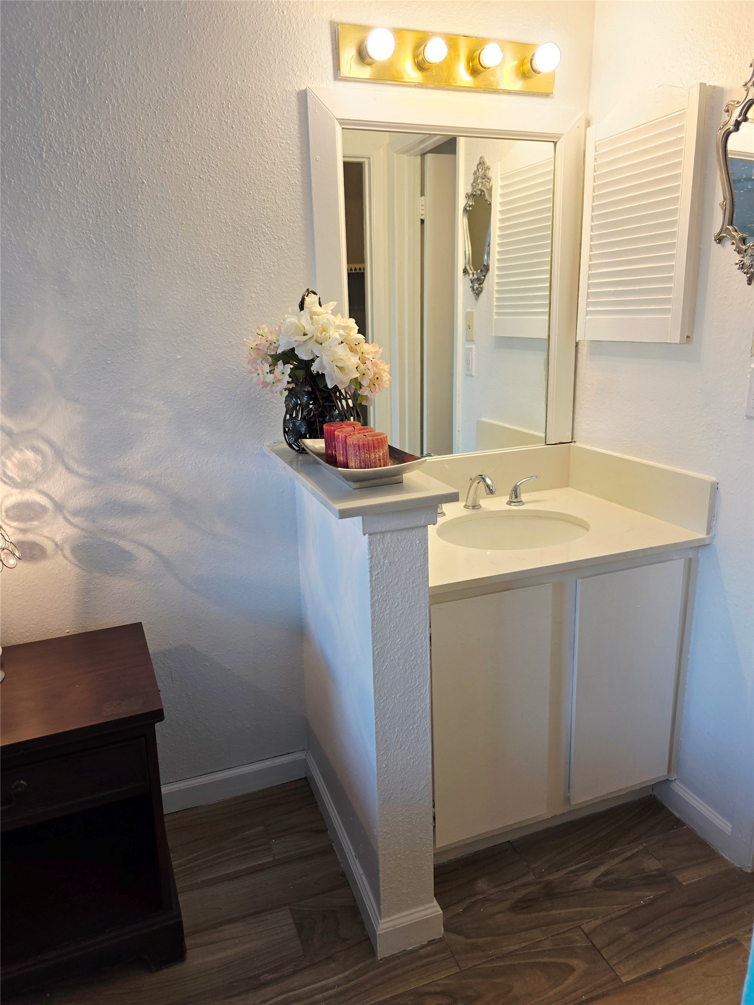 6200 West Tidwell Road, Unit 1702 Houston, TX 77092 - Photo 11 of 24 a room with wooden floor and windows