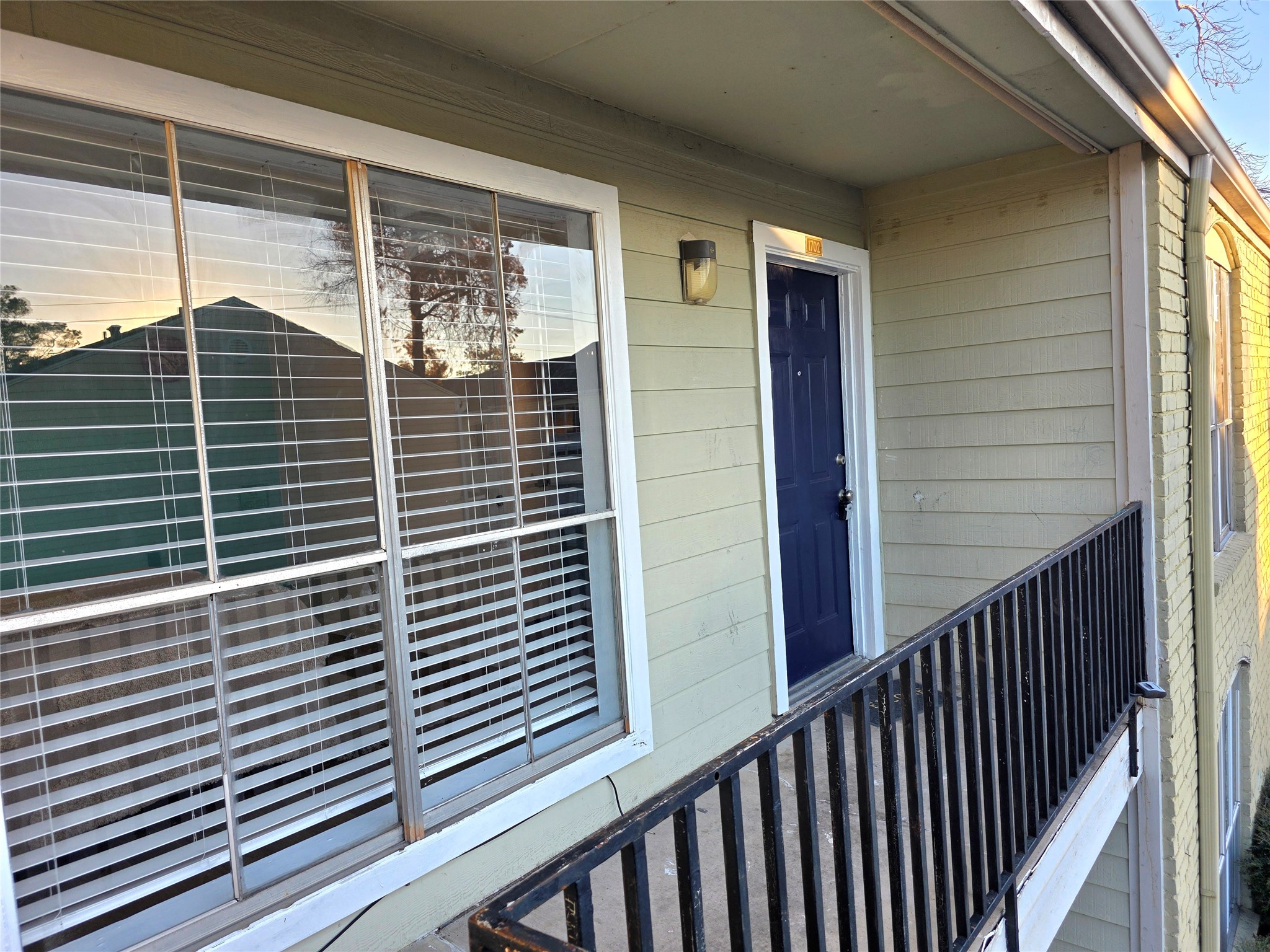 6200 West Tidwell Road, Unit 1702 Houston, TX 77092 - Photo 2 of 24 a view of balcony with a yellow space