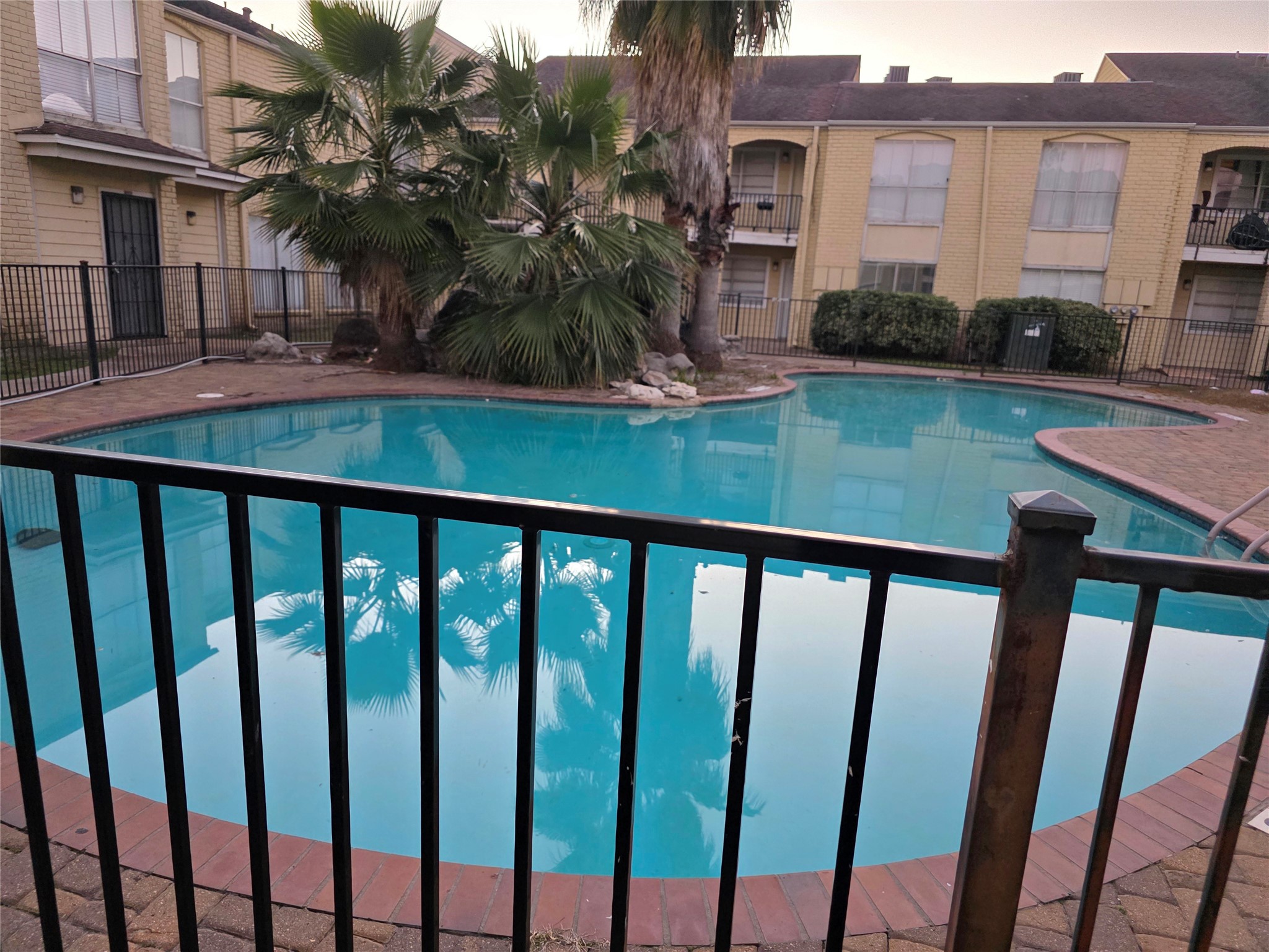 6200 West Tidwell Road, Unit 1702 Houston, TX 77092 - Photo 22 of 24 a view of a porch with a yard