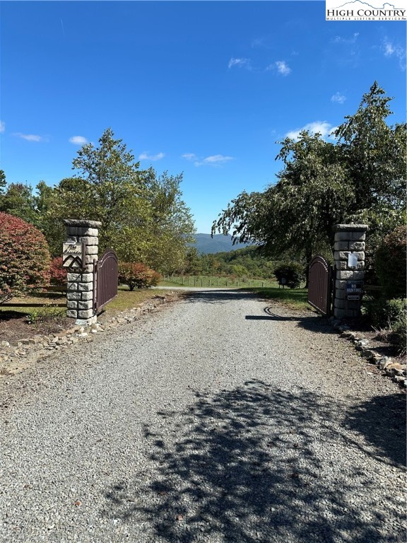 Fishers Peak View Ennice, NC 28623 - Photo 2 of 8 a view of a road with an ocean view