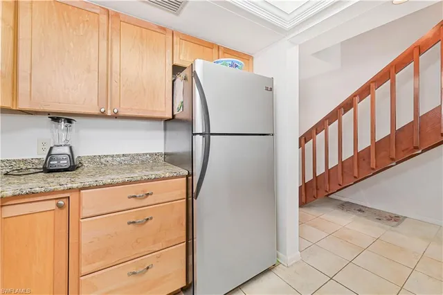 a view of a hallway with windows