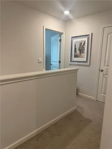 a bathroom with a toilet and a sink