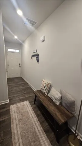 a bathroom with a sink and a window