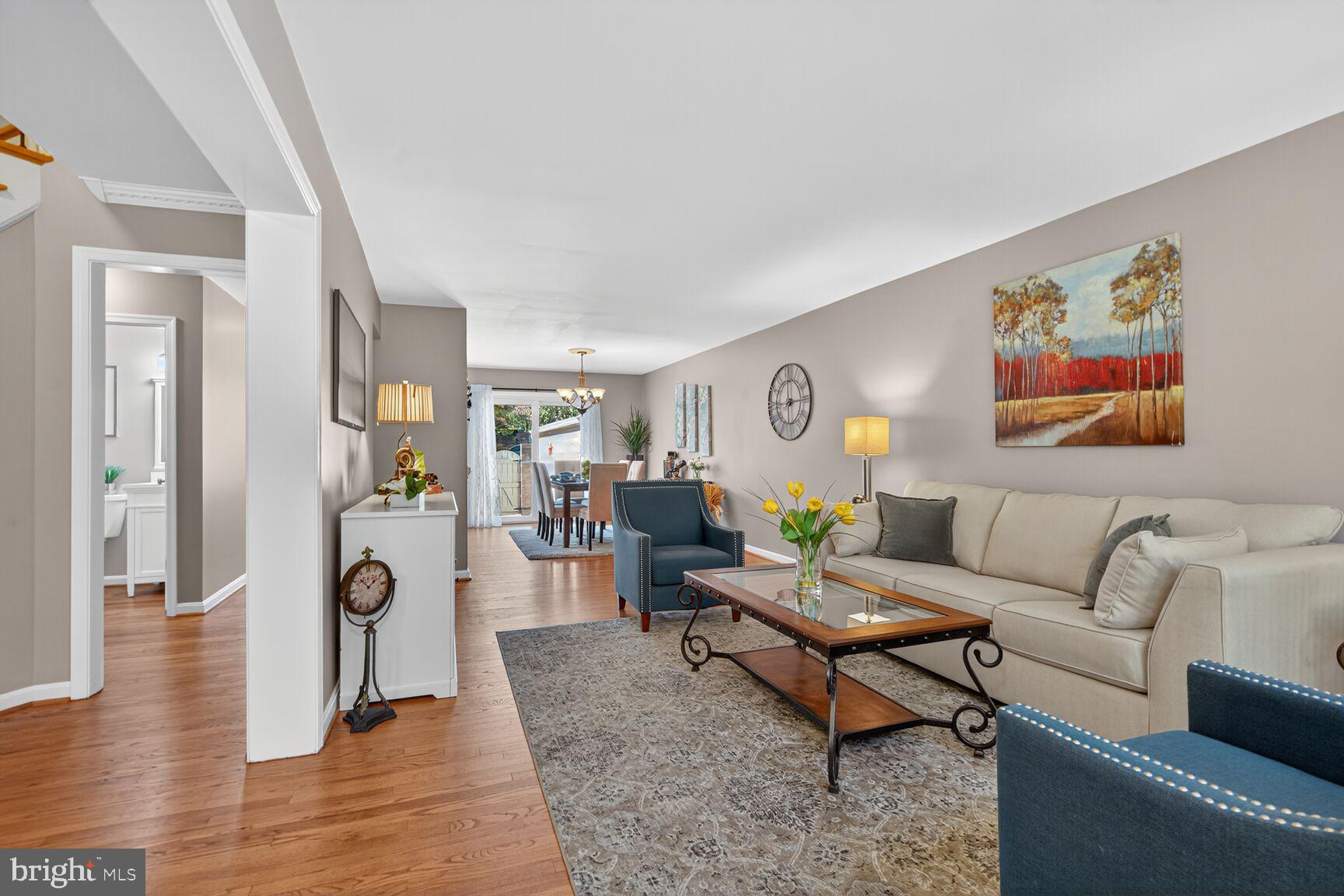 5944 Queenston Street Springfield, VA 22152 - Photo 25 of 60 a living room with furniture and wooden floor