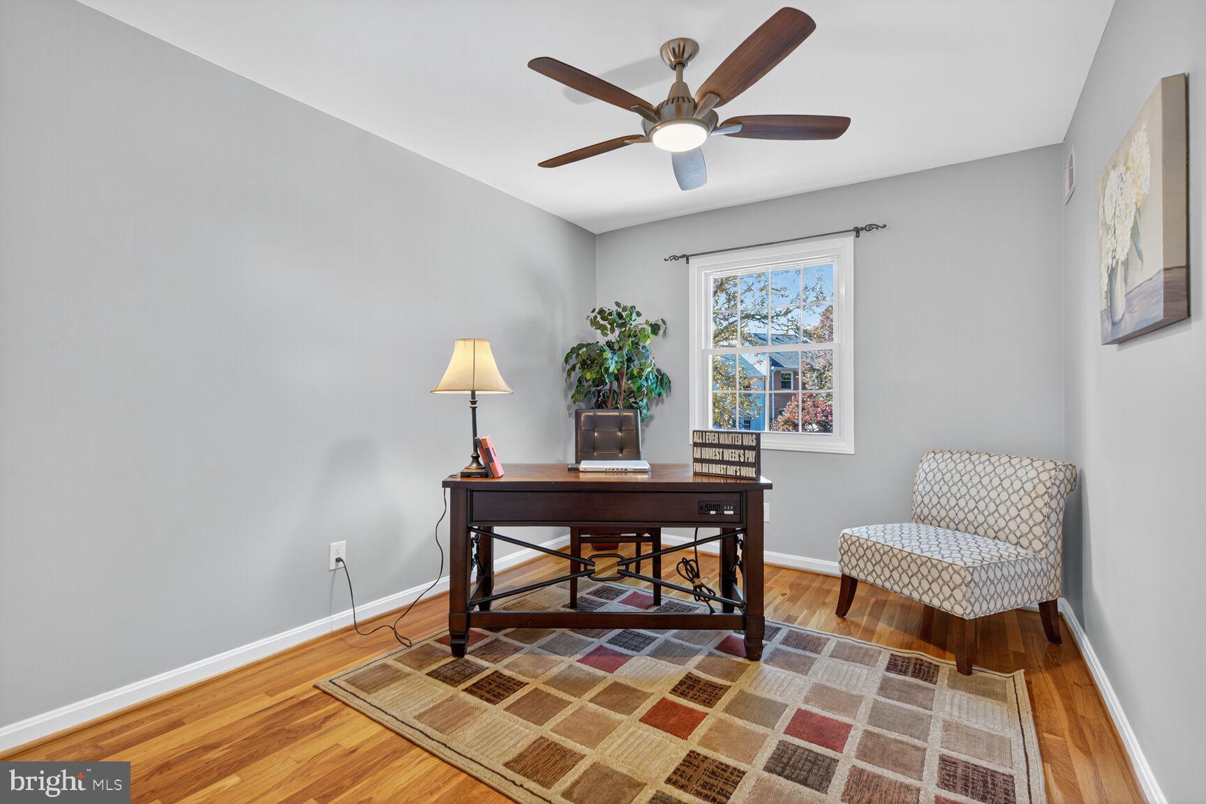 5944 Queenston Street Springfield, VA 22152 - Photo 38 of 60 a living room with furniture and a window
