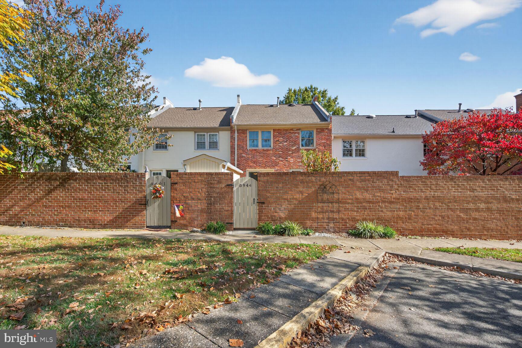 5944 Queenston Street Springfield, VA 22152 - Photo 48 of 60 a front view of house with yard and trees