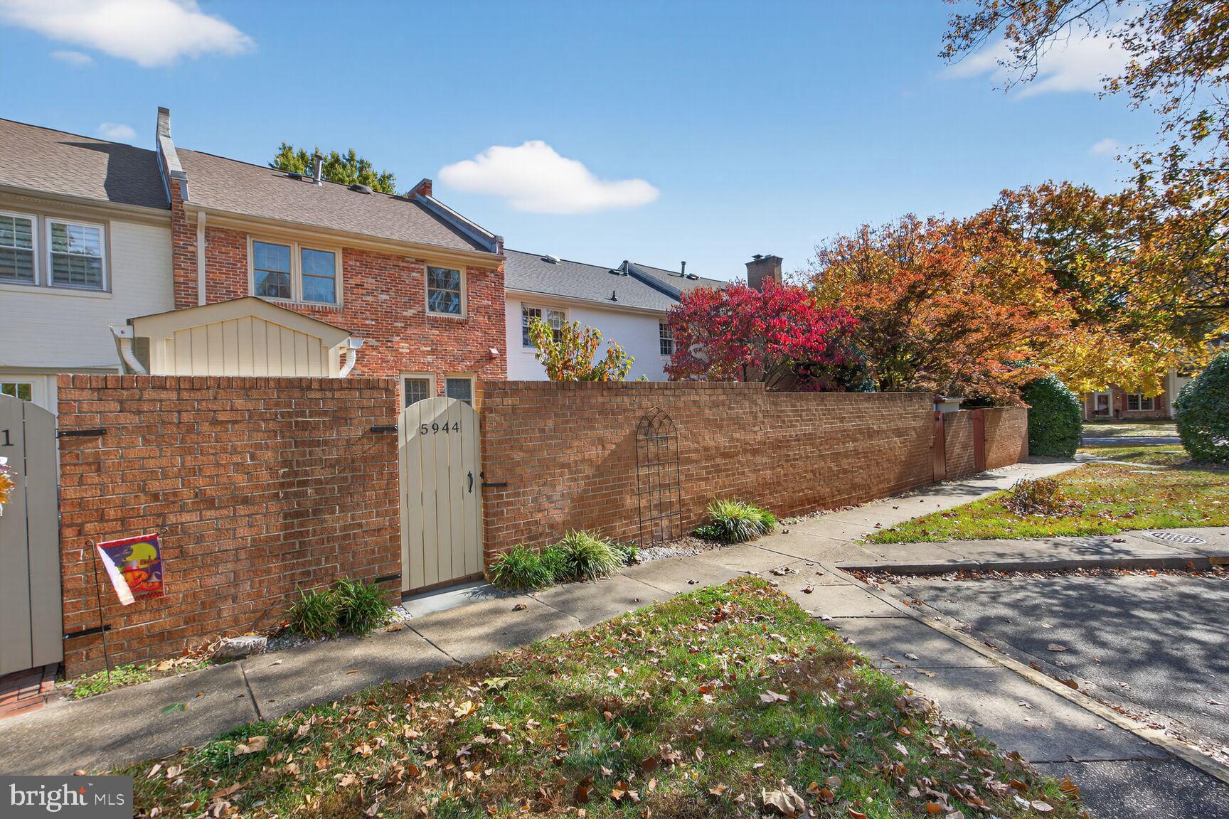 5944 Queenston Street Springfield, VA 22152 - Photo 49 of 60 a front view of a house with garden