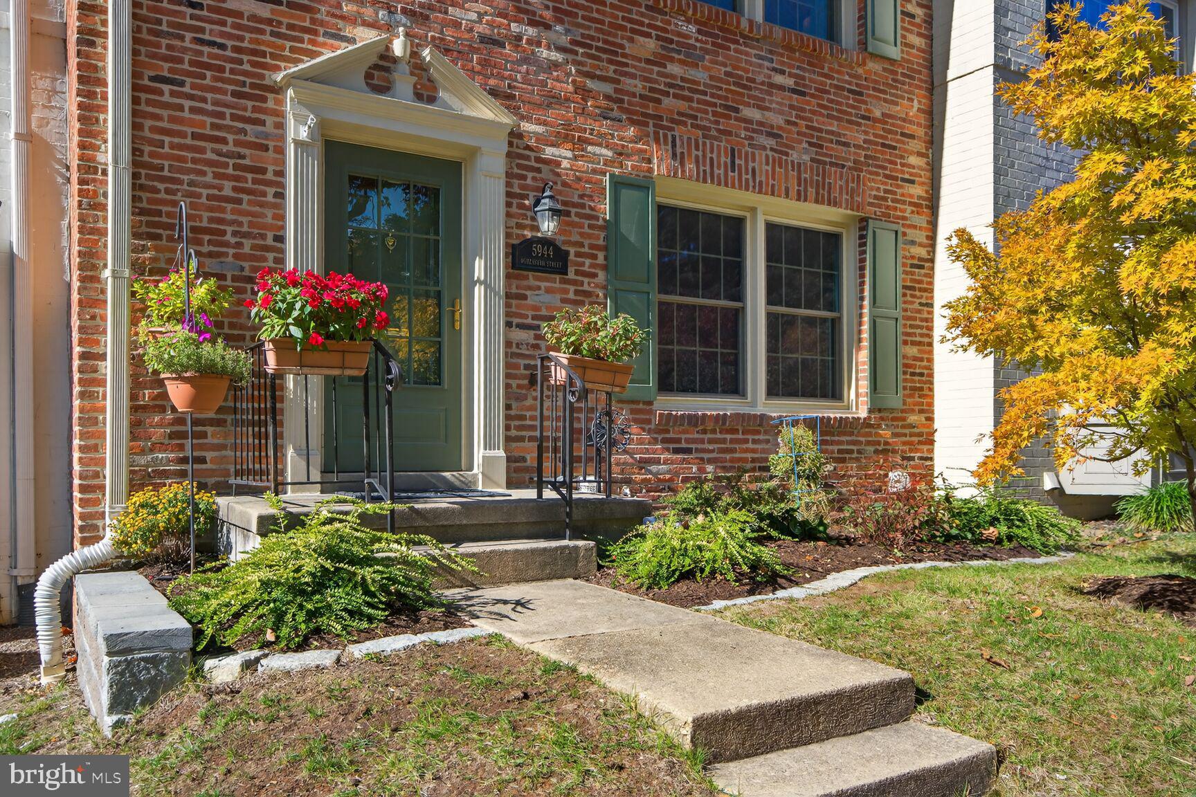 5944 Queenston Street Springfield, VA 22152 - Photo 56 of 60 a front view of a house with a yard