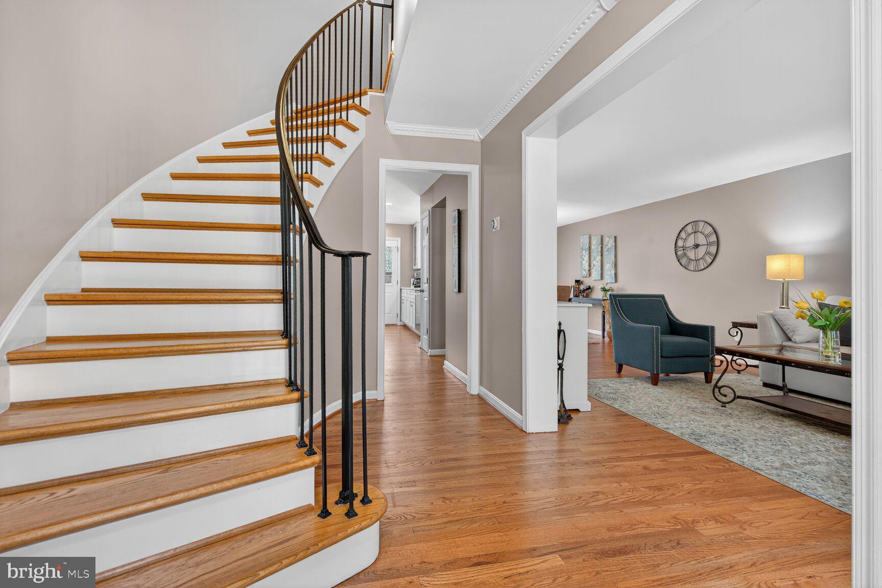 5944 Queenston Street Springfield, VA 22152 - Photo 6 of 60 a view of entryway hardwood and stairs