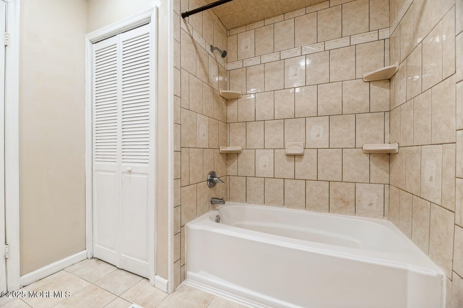7 Sloop Square Freehold, NJ 07728 - Photo 21 of 30 a bathroom with a bathtub and shower
