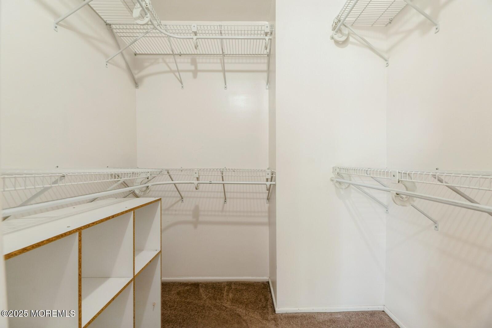 7 Sloop Square Freehold, NJ 07728 - Photo 25 of 30 a bathroom with a sink and vanity