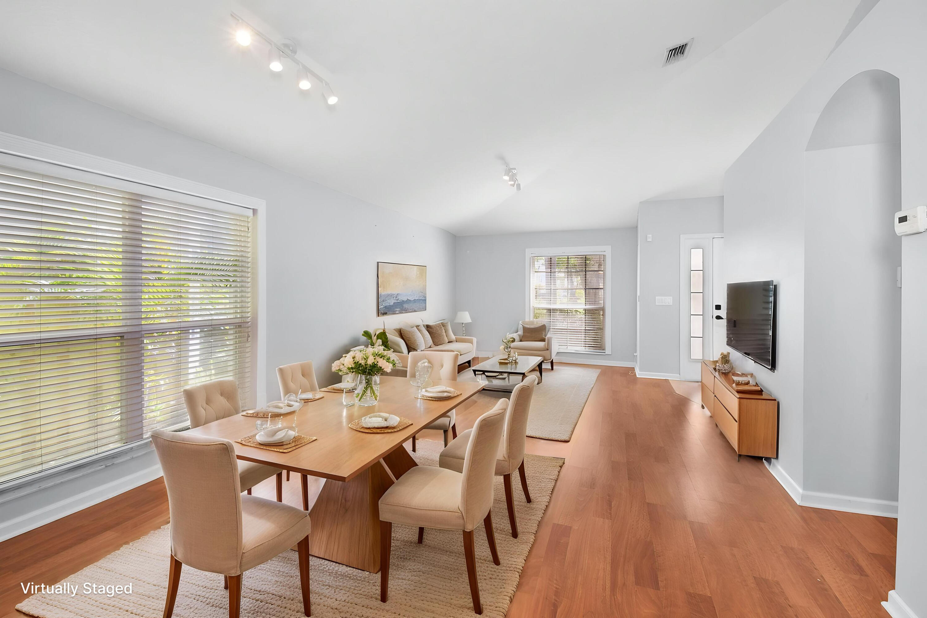 1959 Northwest Marsh Rabbit Lane Jensen Beach, FL 34957 - Photo 6 of 46 Virtually Staged Dining & Living Areas