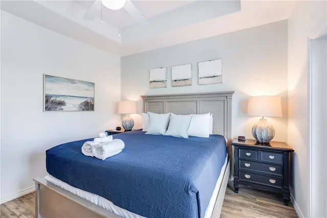 a bedroom with a bed and a table