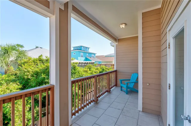 a view of an entryway door and an outdoor space