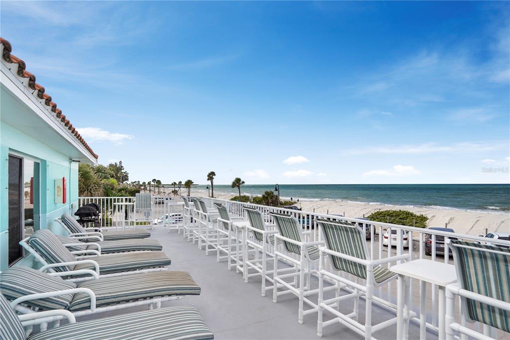 709 Gulf Way, Unit 19 St. Pete Beach, FL 33706 - Photo 1 of 39 a view of a balcony with city view