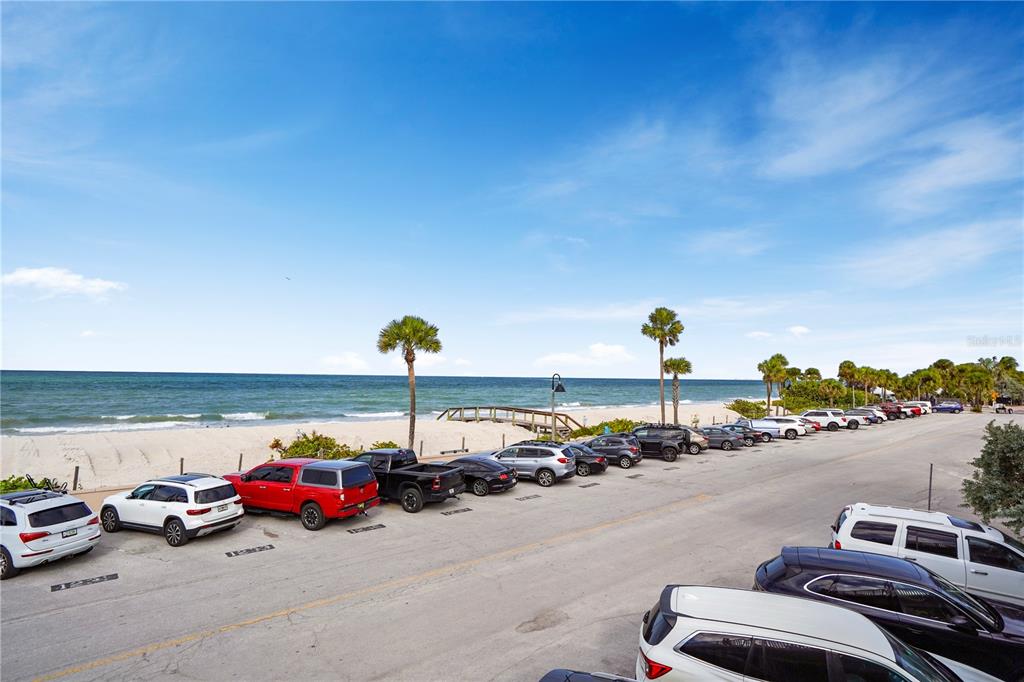 709 Gulf Way, Unit 19 St. Pete Beach, FL 33706 - Photo 4 of 39 a view of a street with cars